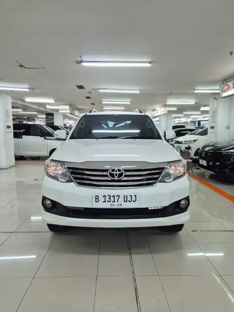 Toyota fortuner 2014 G lux at bensin putih tgn 1