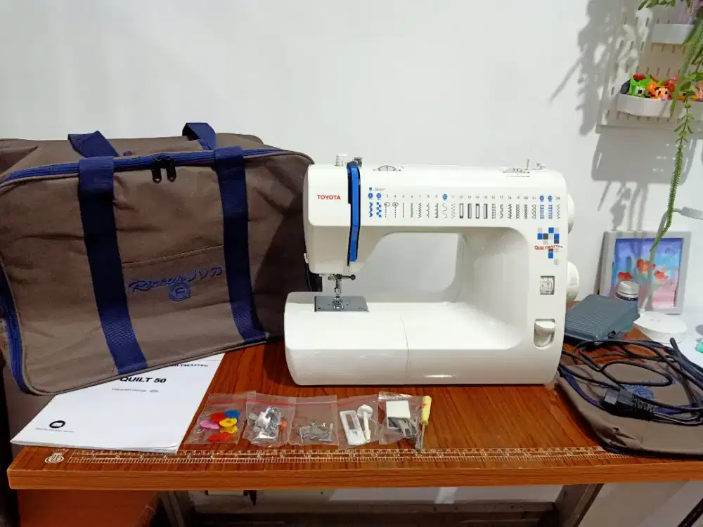 Mesin jahit Portable merk Toyota Quilt 50