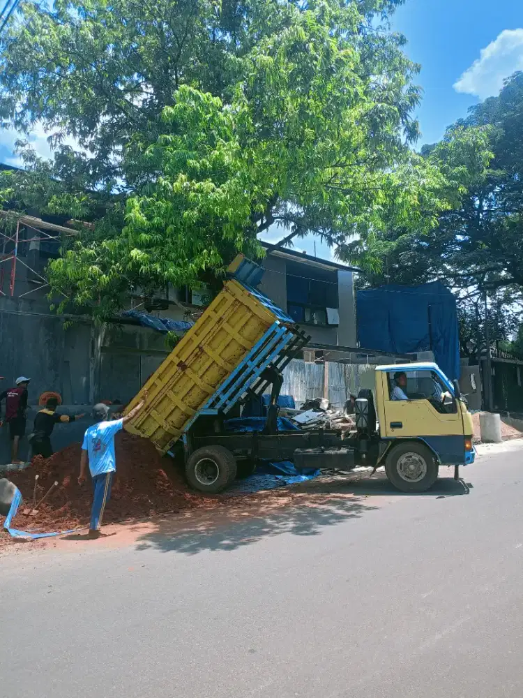Menyediakan pengurugan tanah merah