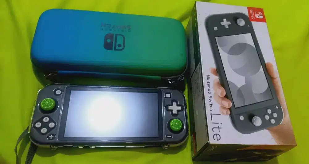 Dijual Switch Lite like New 98% jarang pakai,, BACA DESKRIPSI