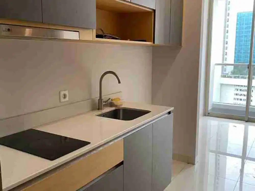 Disewakan studio unfurnished Apt. Taman Anggrek Residence lt. tengah
