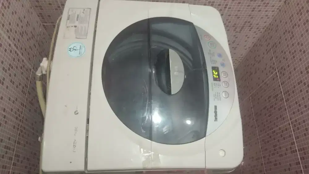 Dijual mesin cuci LG top Loading otomatis Normal berfungsi dengan baik