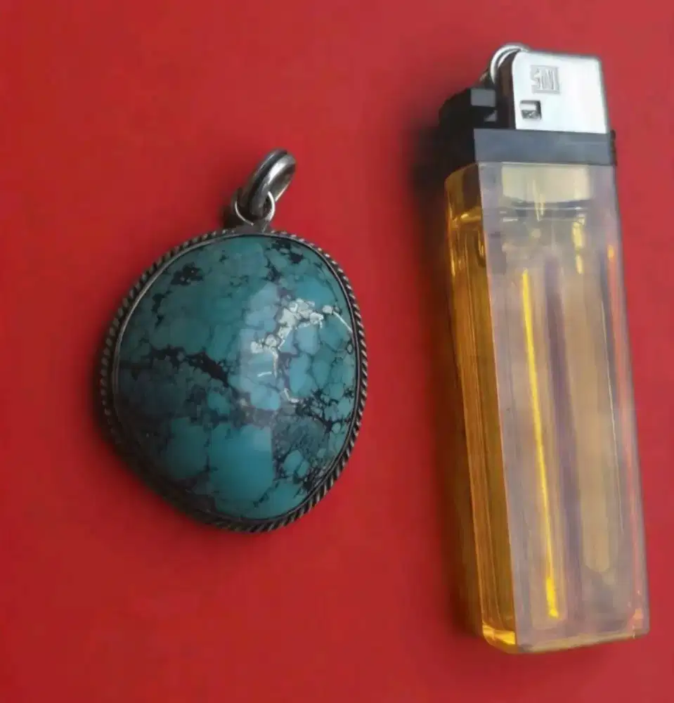 Liontin pirus xingyang