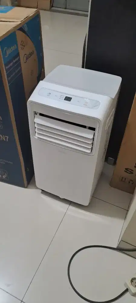 AC portable Midea 1/2 PK