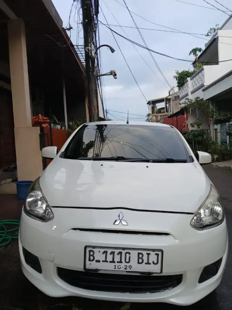 MIRAGE 2014 PUTIH MULUS INDIVIDU