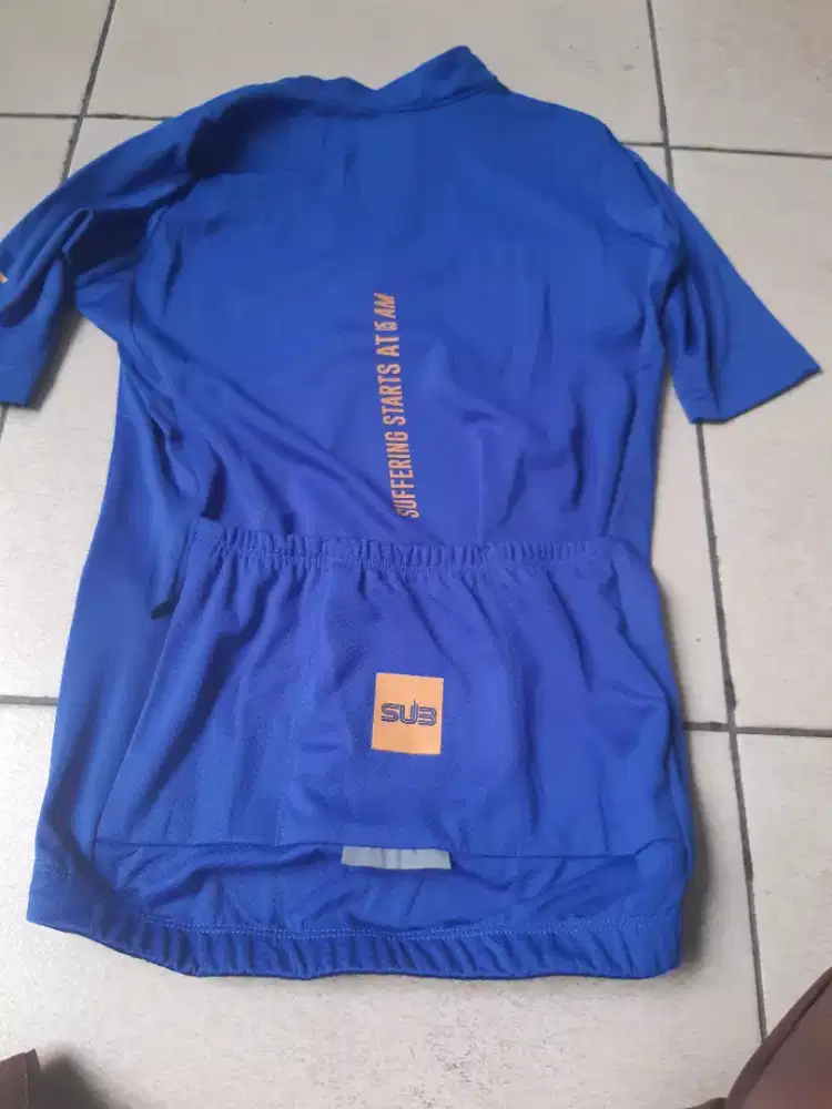 Baju bersepeda merek SUB