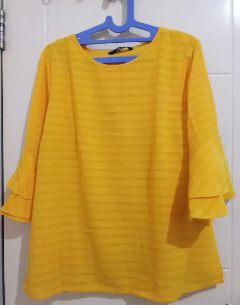 Atasan wanita motif polos