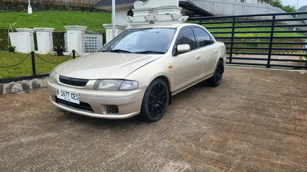 Mazda familia ss thn 1997 manual plat B pajak isi lokasi bandung