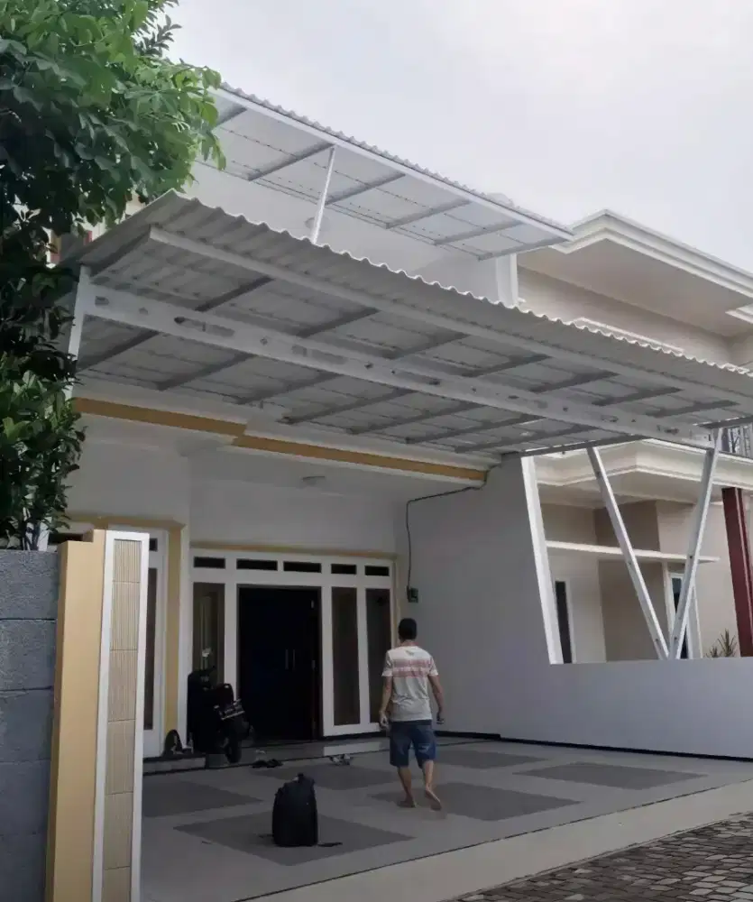 Kanopi baja ringan dan garasi