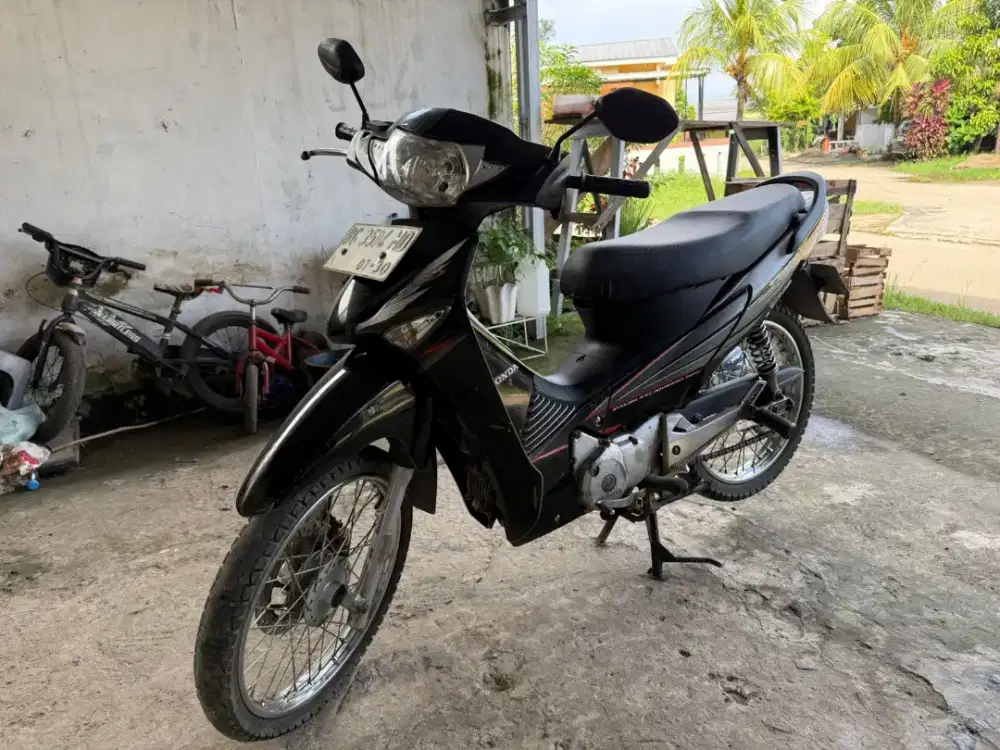 Supra x 1wt tahun 2005