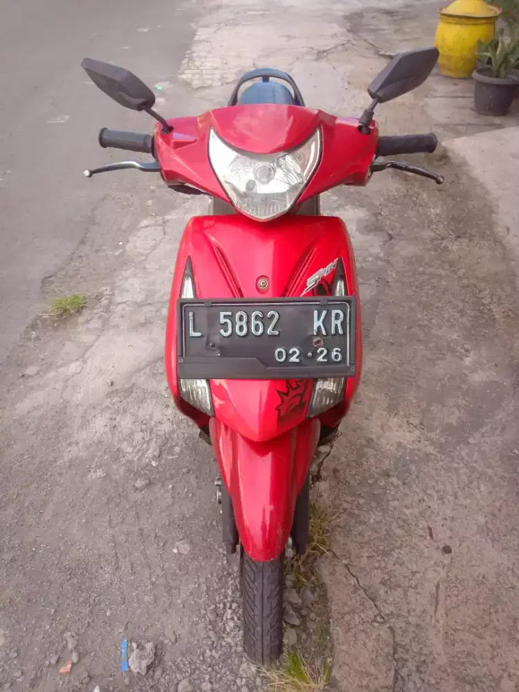 Suzuki Spin merah