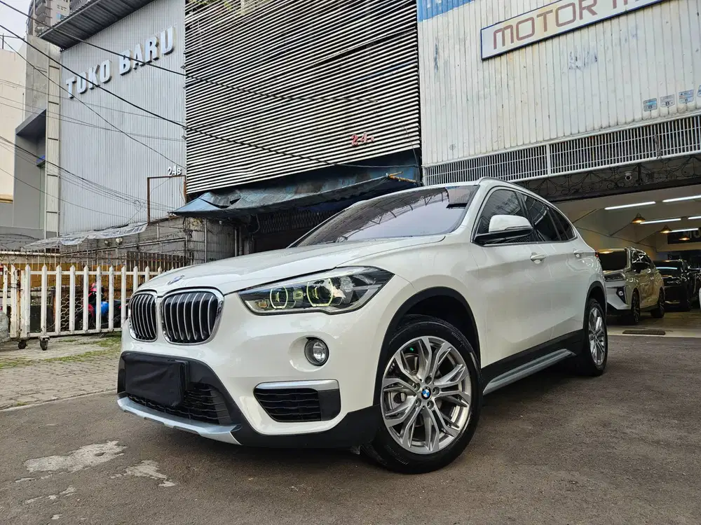 Antik cat ori BMW X 1 sdrive 1.8i panoramic 2019 nik 2018 putih X1 F48