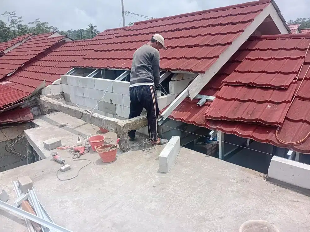 Tukang bangunan dan bcoran