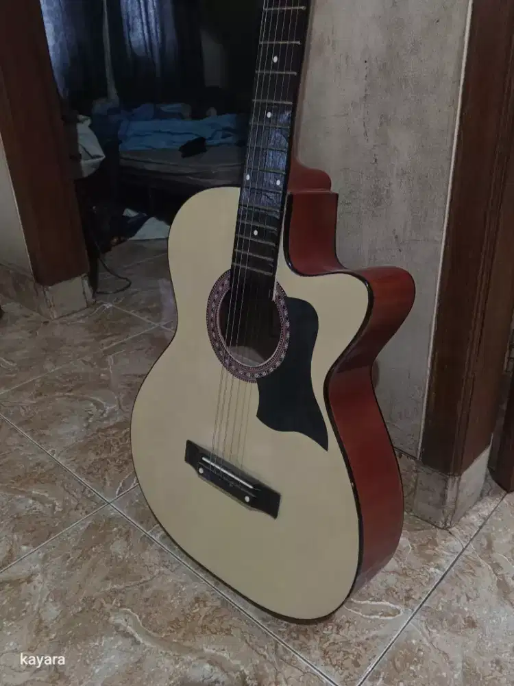 Gitar jarang pakai