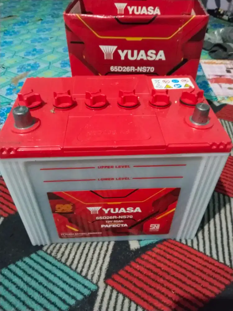 Aki mobil yuasa 12v 65Ah masih baru