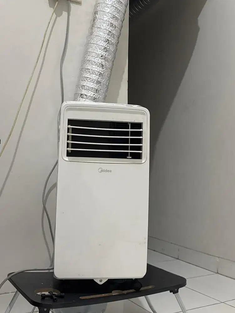 Ac portable midea 1/2 pk