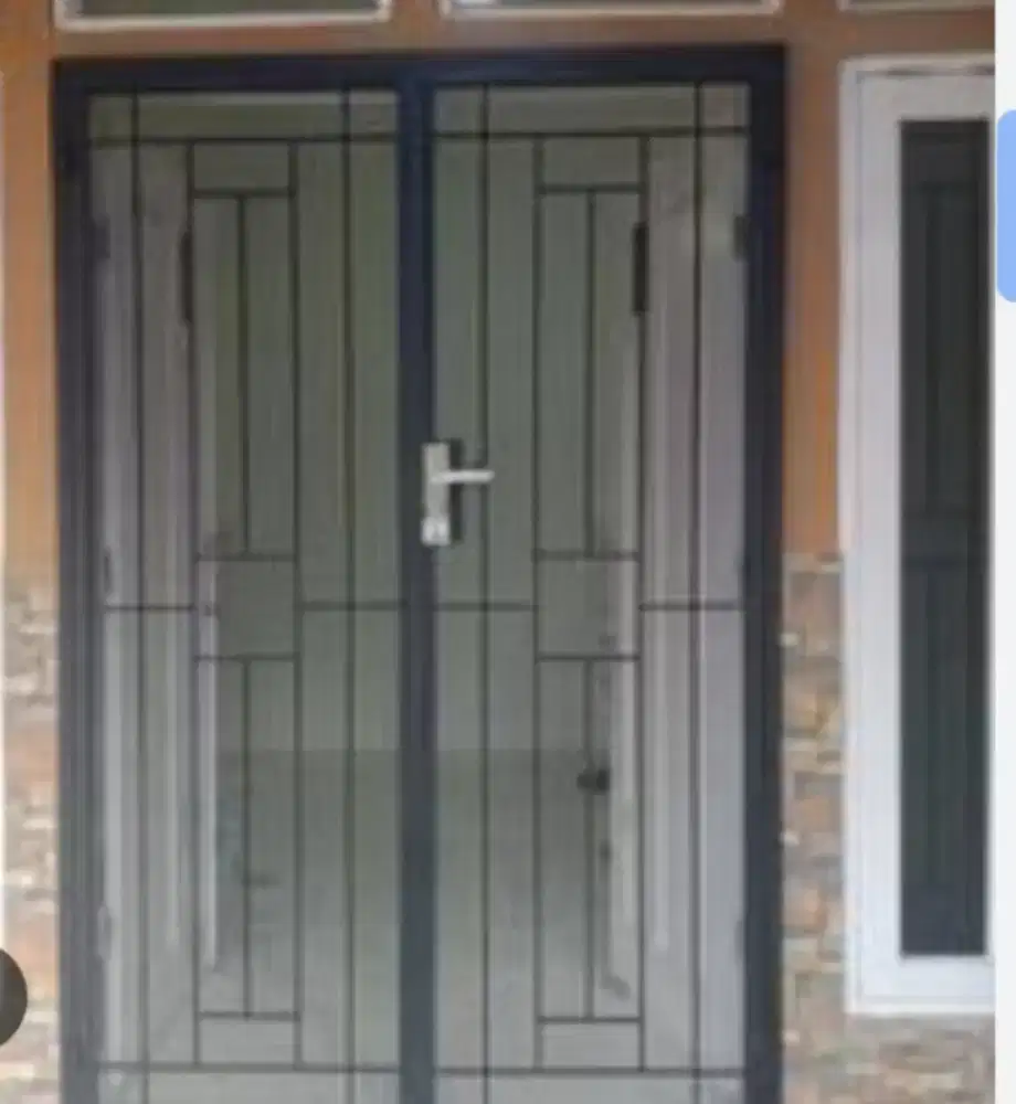pintu dabel besi dan tralis minimalis