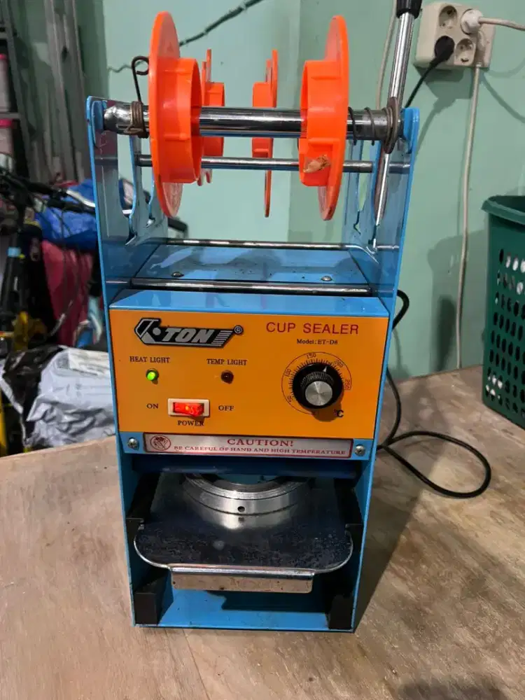 Mesin cup sealer merk K•ton