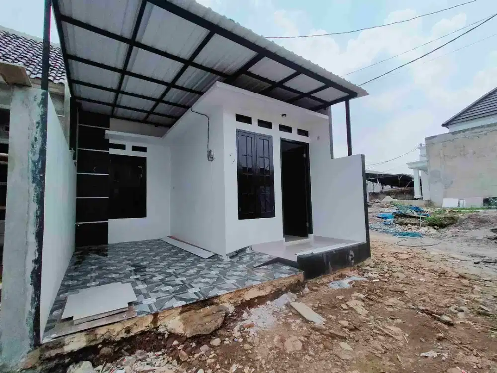 Sisa 1 unit lagi free kitchen set dan keramik carport nya..