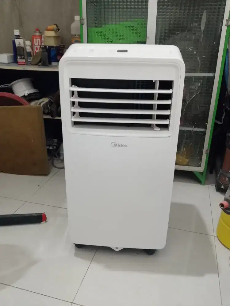 ac portable midea 1/2 pk