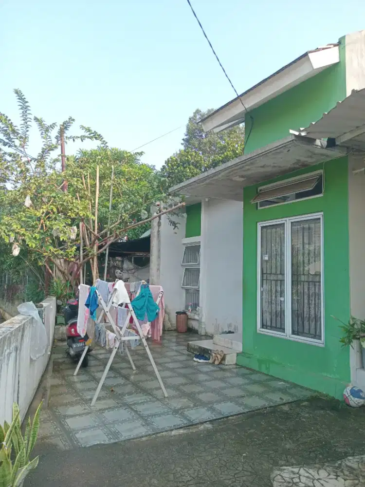 Rumah Cluster di Pojok Ada Garasi dan Halaman