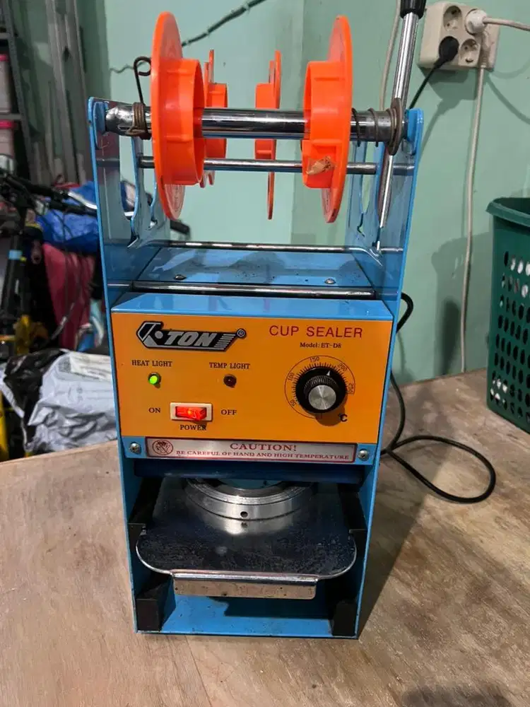 Mesin cup sealer merk K•ton