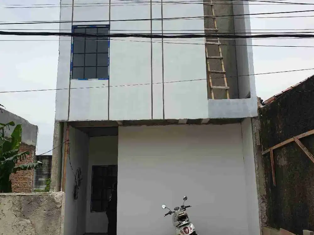 rumah 2 lantai tinggal finishing,harga murah,bebas banjir di jalan swadaya,perwira,Bekasi utara
