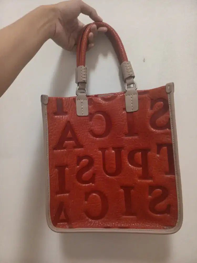 Tas Pusicat warna merah