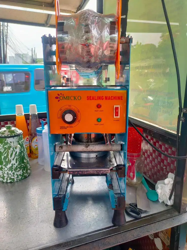 Mesin Sealer Omicko
