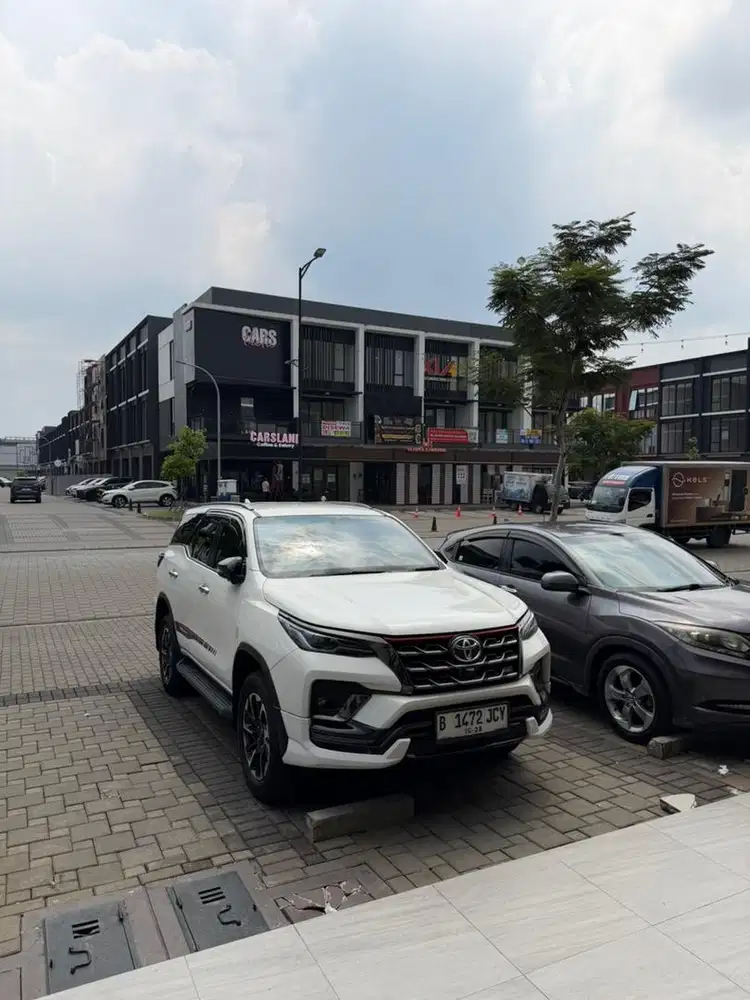 Fortuner trd bibir merah