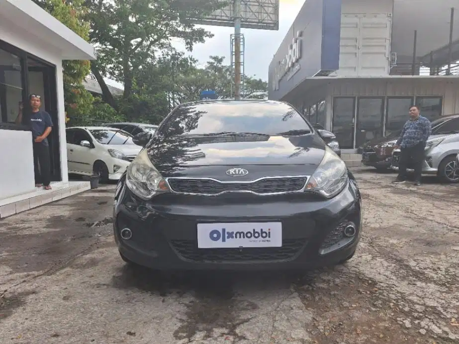 DP MURAH Kia Rio 1.4 Bensin-MT 2014 Hitam CXGLD