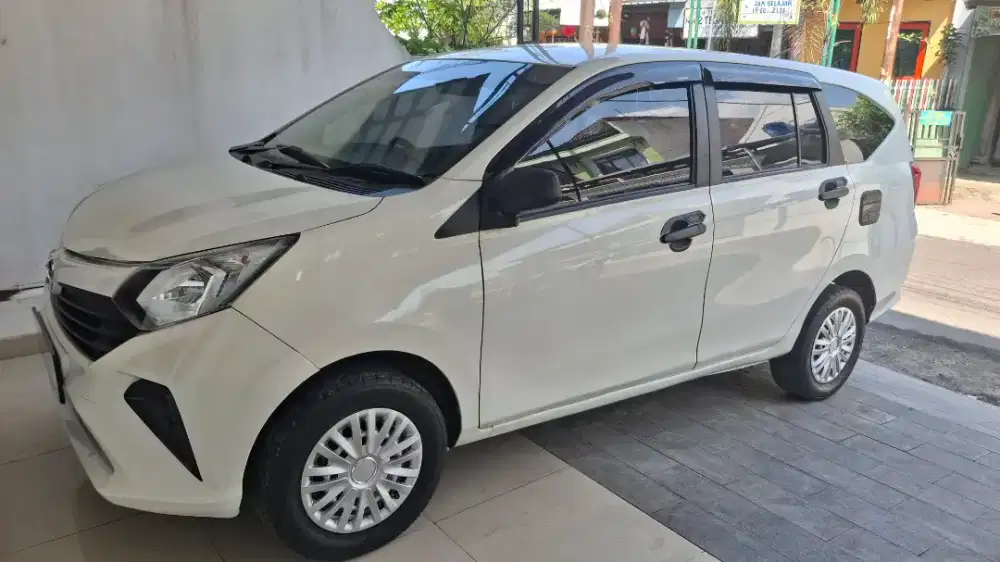 Sigra D 2023 manual warna putih