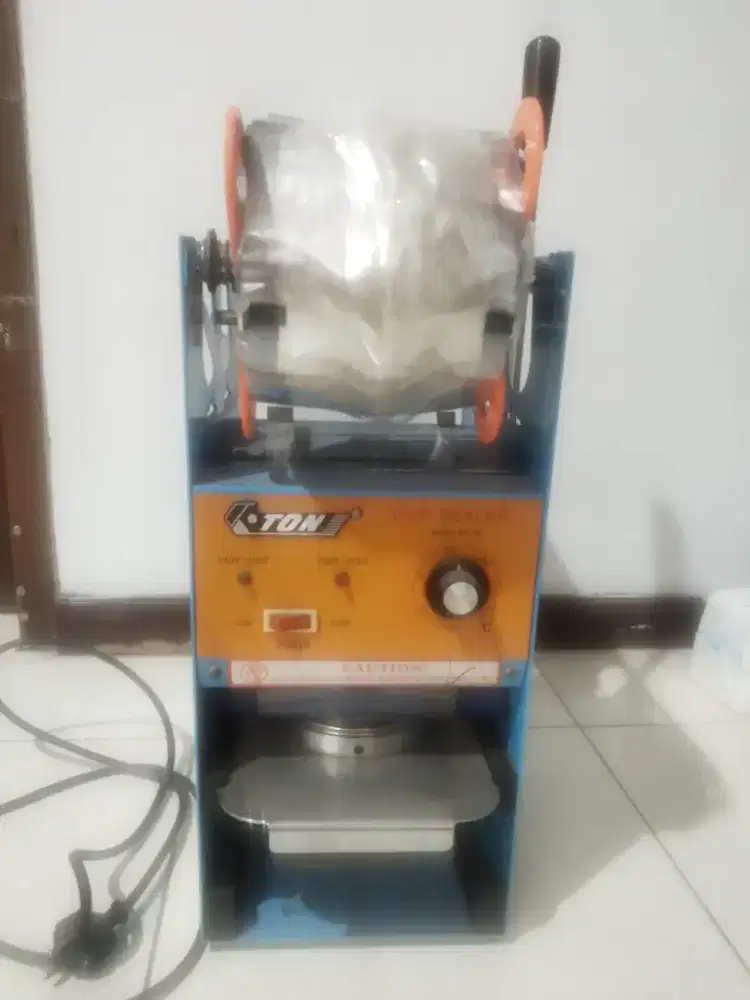 Mesin cup sealer