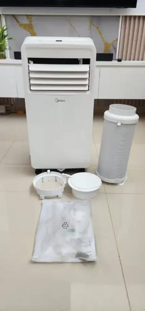 AC Portable Midea 0.5 PK