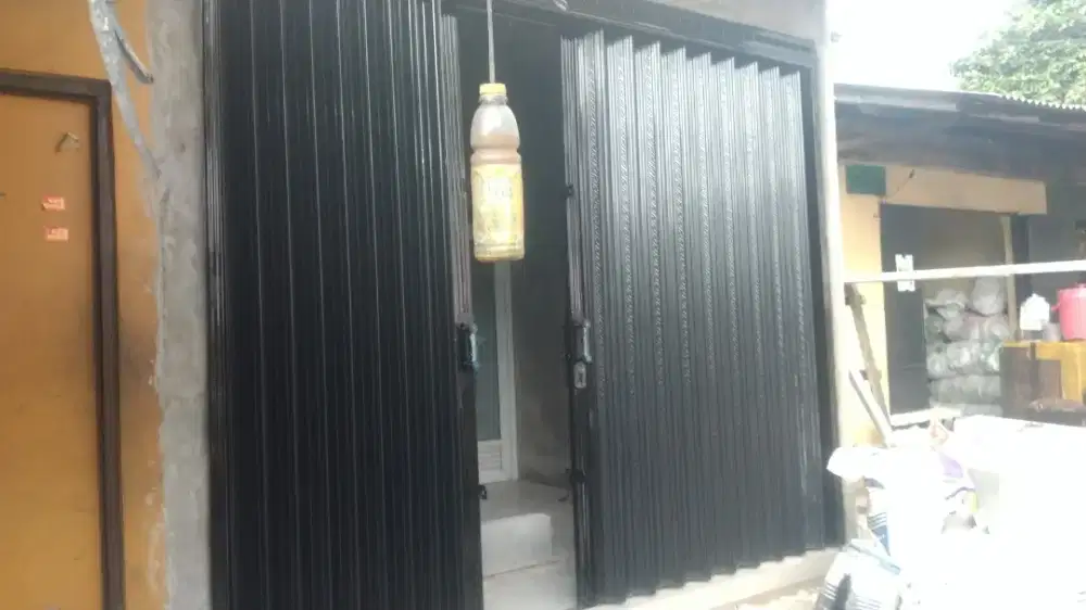 PINTUN WARUNG TAHAN TERHADAP KARAT
