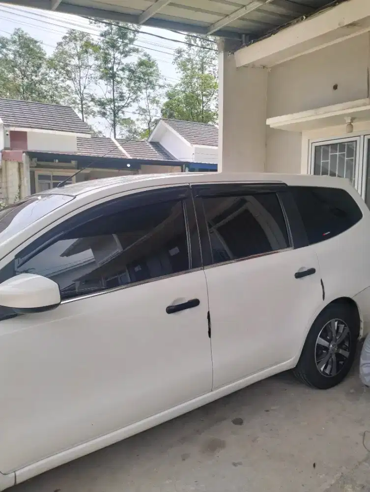 Melayani bongkar pasang kaca film mobil