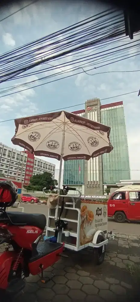 Penjual Kopi Keliling Sepeda Listrik