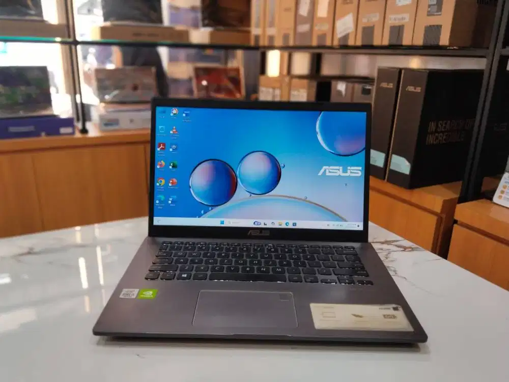ASUS A409J	CORE I5-1035G1/RAM 8GB/SSD 256GB/14 INCH/NVIDIA MX330 2GB