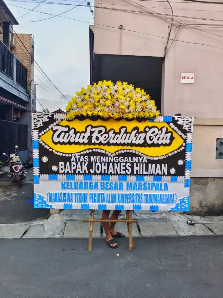 Karangan bunga papan ucapan Duka cita