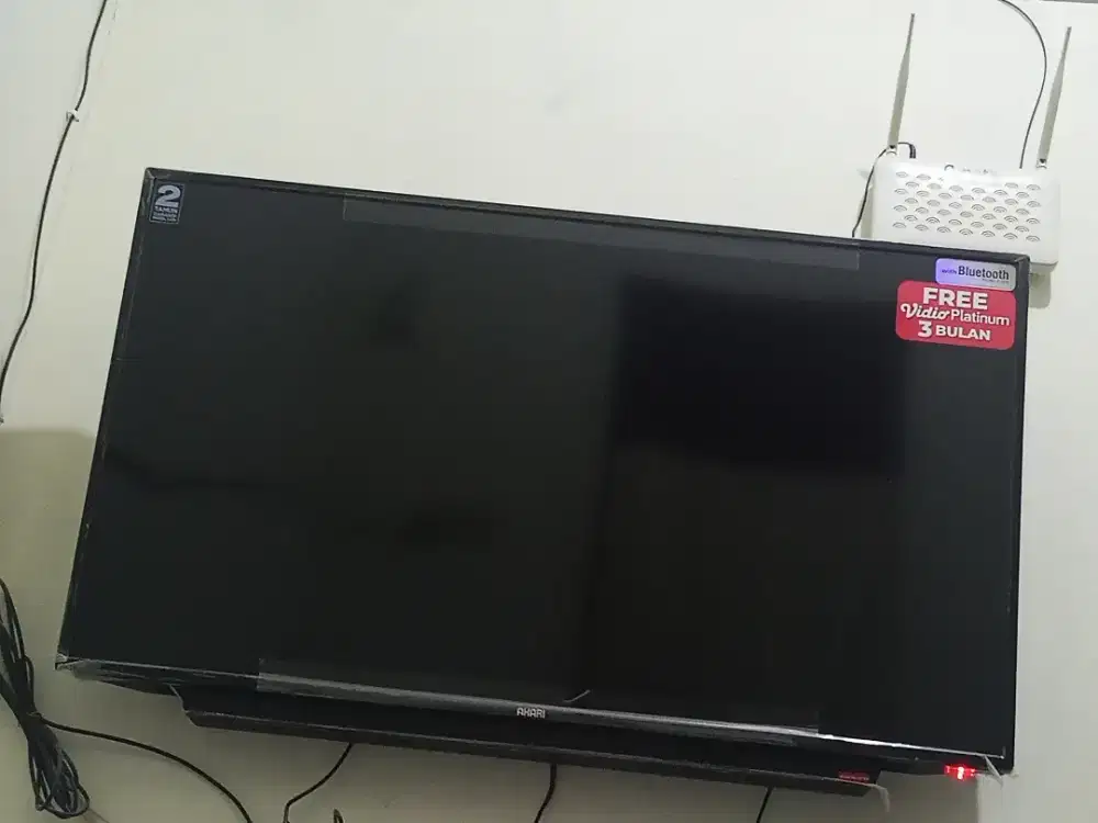 Tv merek Akari 43 inch GK pke set box LG.
