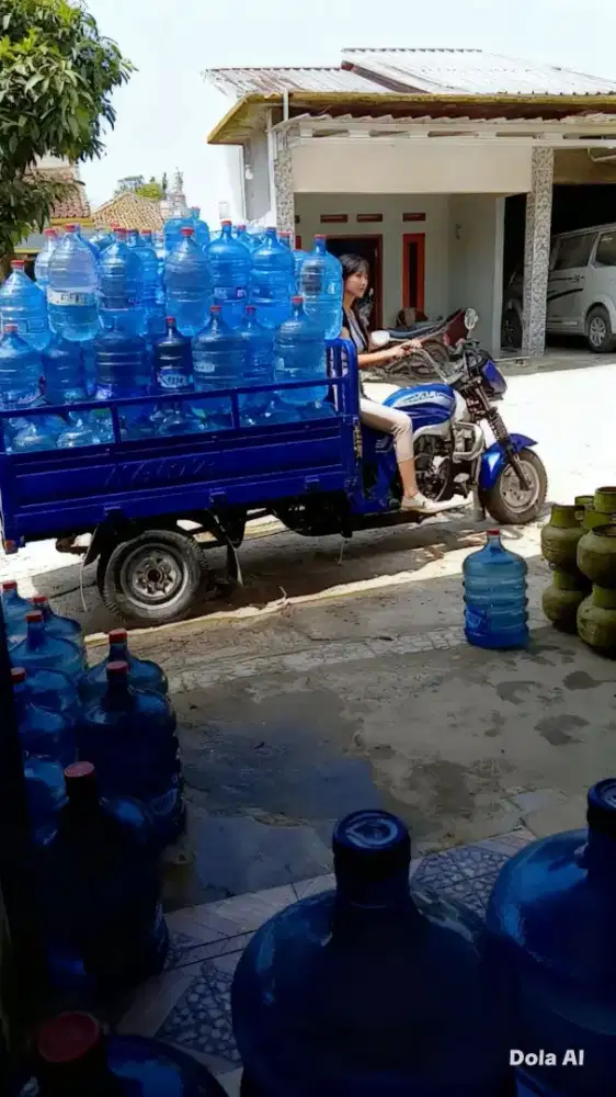 AIR dalam kemasan botol Galon RO