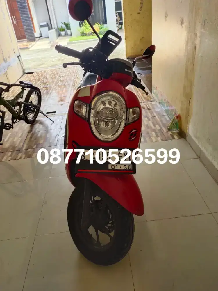 Scoopy merah ban donat
