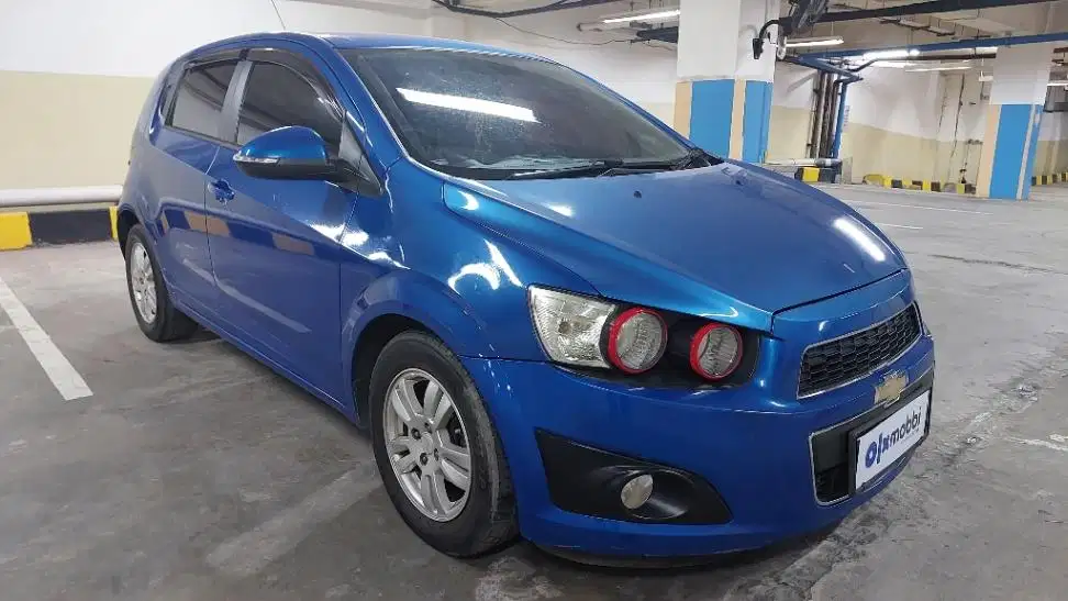 DP MURAH Chevrolet Aveo 1.4 LT Bensin-MT 2014 Hitam CFMGB