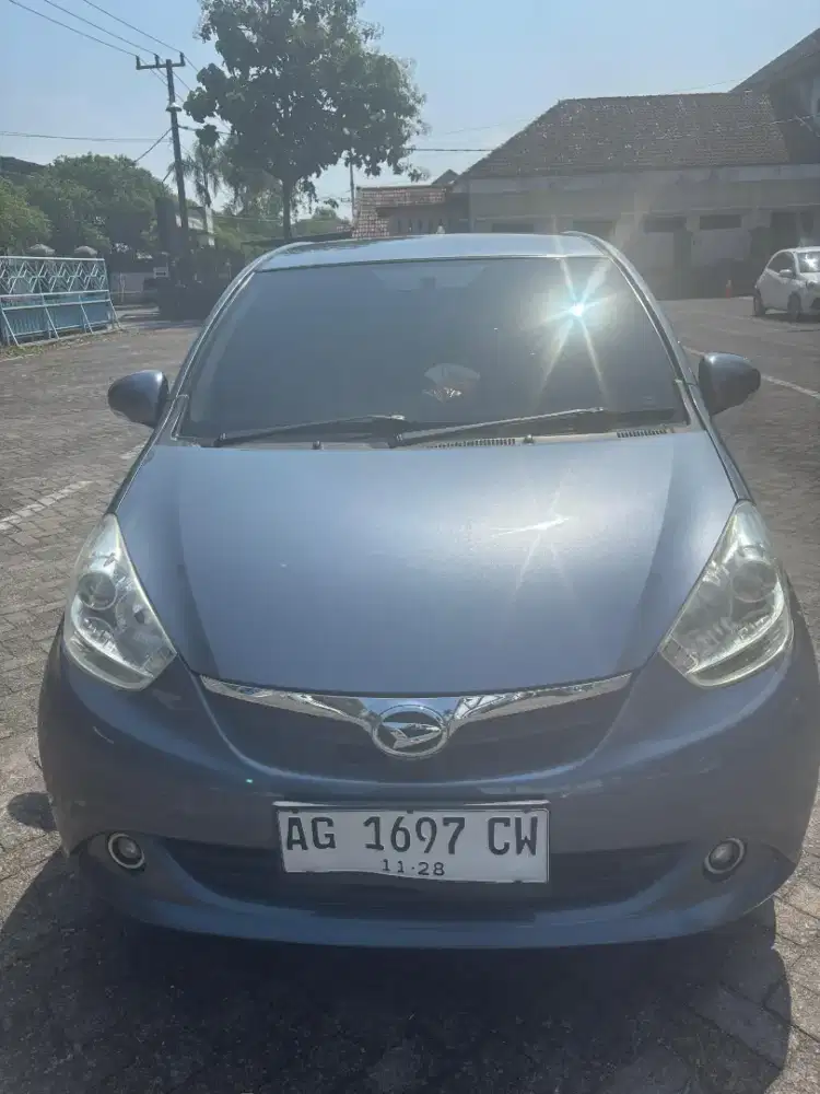 Daihatsu Sirion 1.3 AT/2014/Abu-Abu Metalic