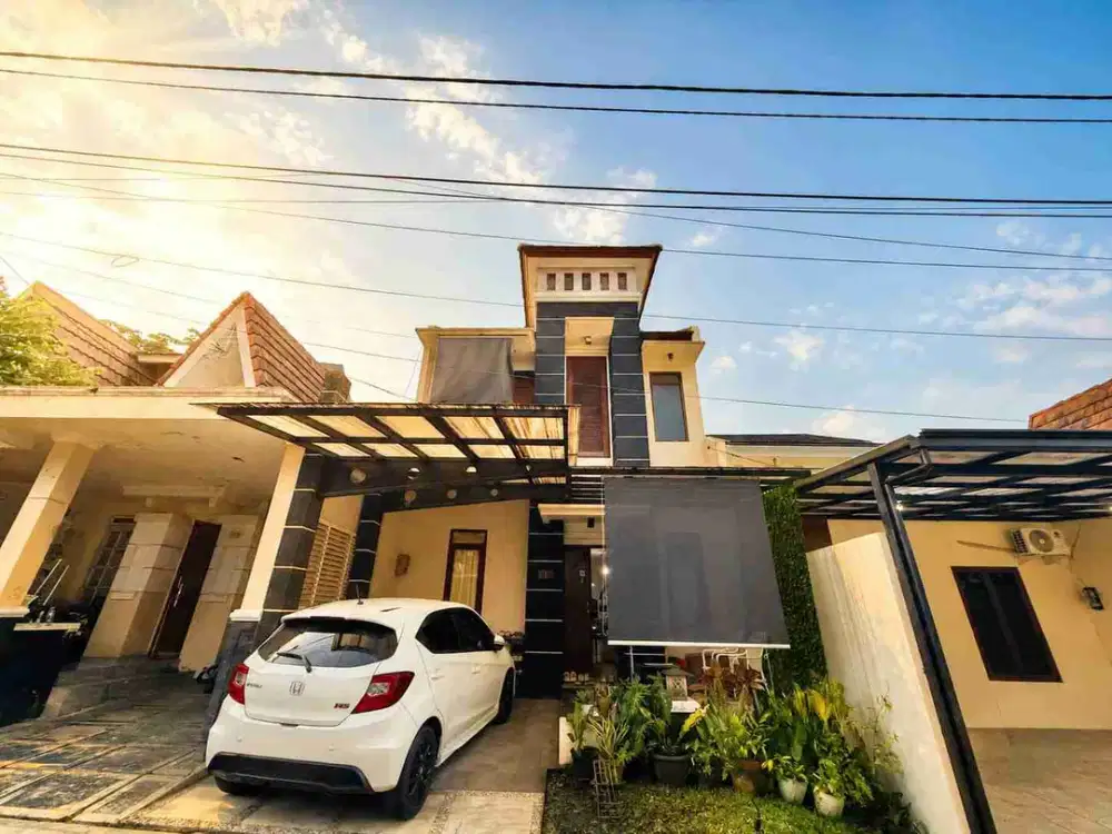 Rumah cantik dekat perkotaan lingkungan asri 2 lantai fully furnished di Sentul City Bogor