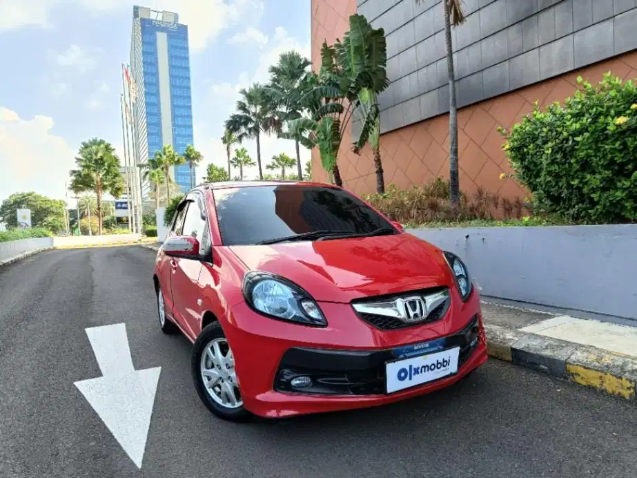 DP MURAH Honda Brio Satya 1.2 E Bensin-MT 2014 Merah CCKLB