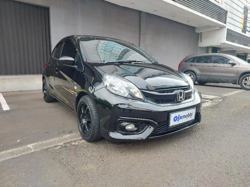 DP MURAH Honda Brio Satya 1.2 E Bensin-MT 2017 Hitam CVBDB
