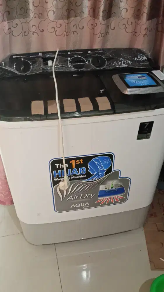 Mesin cuci merk Aqua