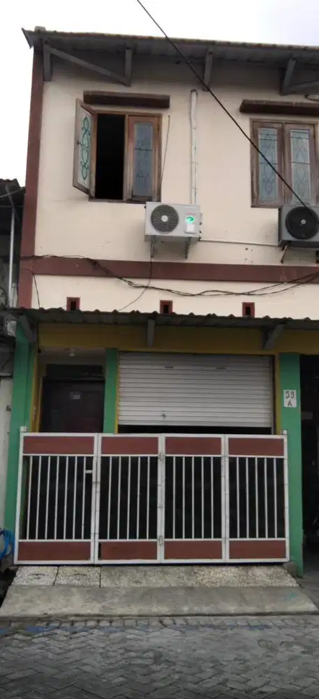 Rumah di kontrakan di pusat kota surabaya