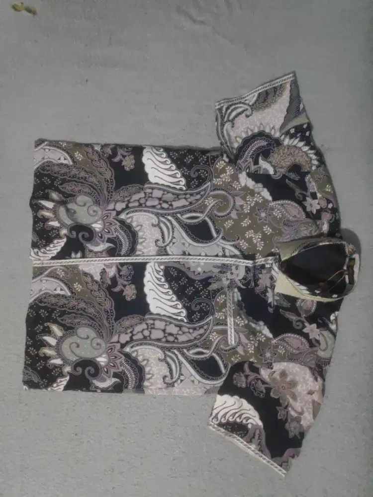 Baju batik masih baru